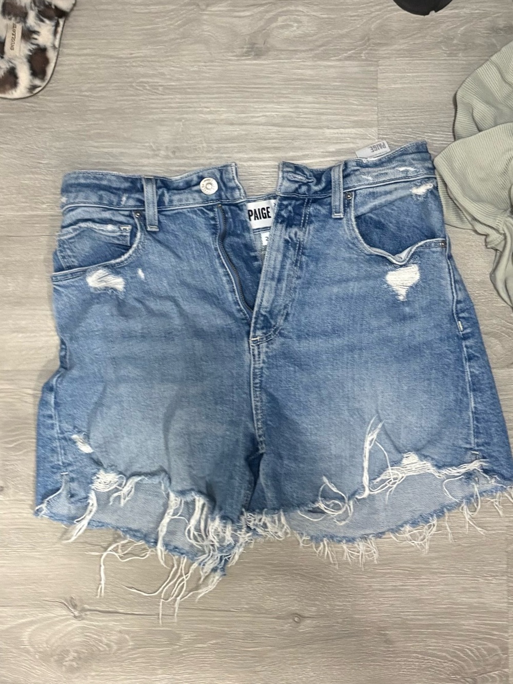 PAIGE Light Blue Distressed Denim Shorts